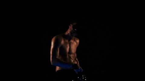 Silhouette of a dancing sexy man 스톡 동영상 91600174