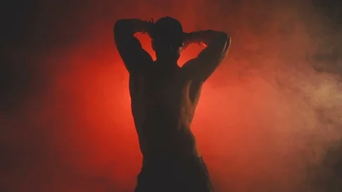 Silhouette of a dancing sexy man Vídeo Stock 103156307