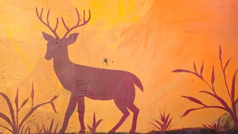Silhouette of a deer on a wall background Stock Photos