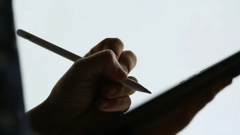 Silhouette design drawing on digital tablet with stylus pen Stock Footage 88775432