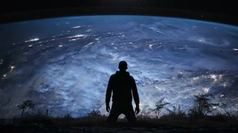 Silhouette Of A Desperate Man In Front Of Night Earth Contemplating Human Self Stock Footage 195195087