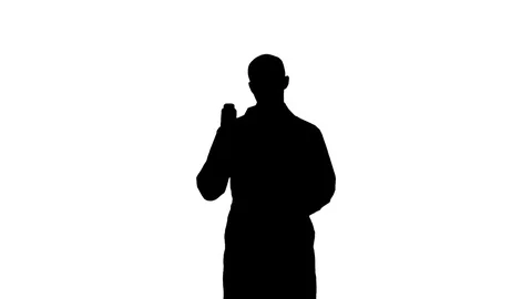 Silhouette Doctor explaining difference between the pills Stock Footage 73620853