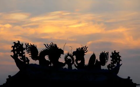 Silhouette dragon with sky Stock Photos
