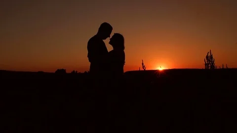 old couple kissing silhouette
