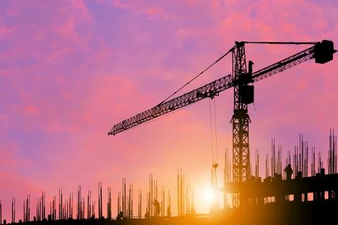 Silhouette of Engineer and worker on building site, construction site Fotos de archivo
