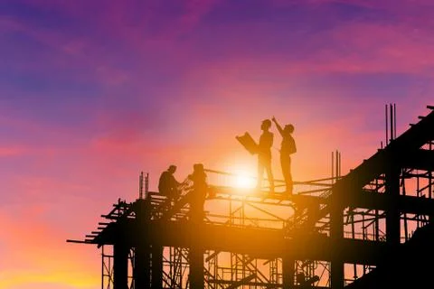 Silhouette Engineer and worker on building construction site with clipping path Photos