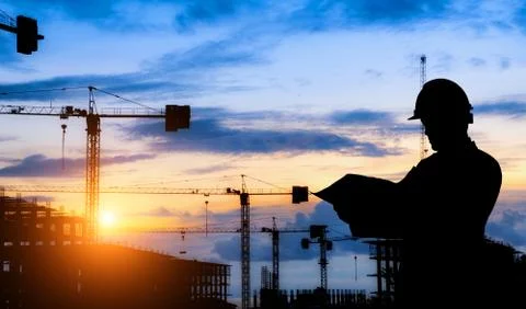 Silhouette engineer standing work on construction. Stock Photos