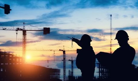 Silhouette engineer standing work on construction. Stock Photos