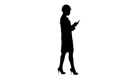 Silhouette Engineer using mobile phone texting while walking. Stock Illustration