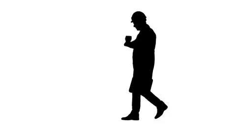 Silhouette Engineer walking in a rush and looking at his watch. Illustrazione stock