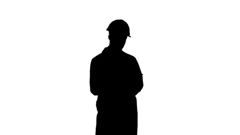 Silhouette Engineer in white coat preparing report Stock Footage 73620585