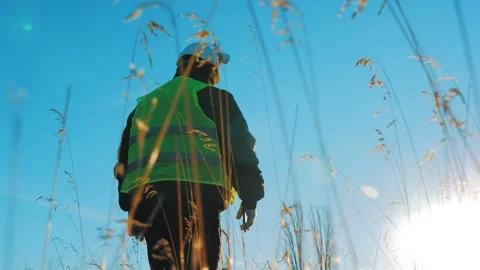 Silhouette engineer working on satellite dish telecom network on Stock Footage 144756385