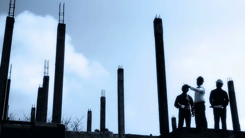 Silhouette of engineers  on construction site Stock Footage 78486259