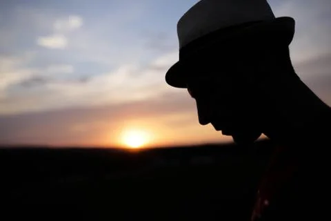 Silhouette faces at sunset Stock Photos