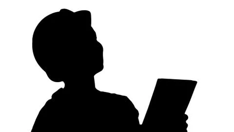 Silhouette Female construction engineer with a tablet computer at a construction Illustrazione stock