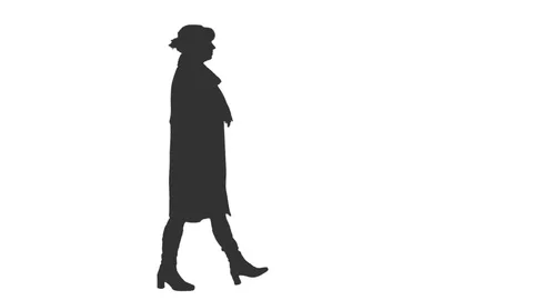 Silhouette of a female pedestrian walking in the street, alpha channel Video stock 76428362