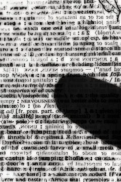 Silhouette of finger on encrypted message Stock Photos