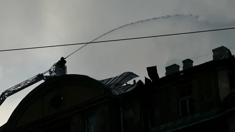 Silhouette of firefighter fighting fire 스톡 동영상 99327506