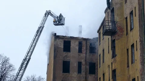 Silhouette of firefighter fighting fire Stock Footage 99399601