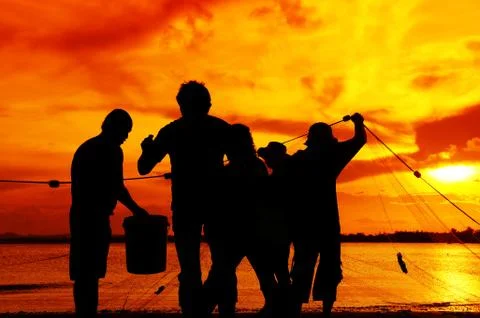 Silhouette fishman Stock Photos