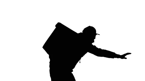 Silhouette Food delivery man walking in severe weather conditions. Stock Footage 151206853
