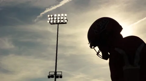 Silhouette of football player Stock Footage