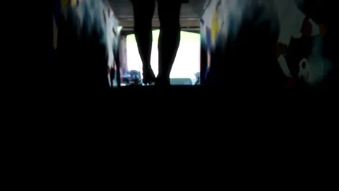 Silhouette of a football player getting out from a tunnel of a stadium Stock Footage