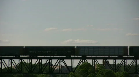 Silhouette of a freight train moving down tracks (High Definition) Stock Footage 360842
