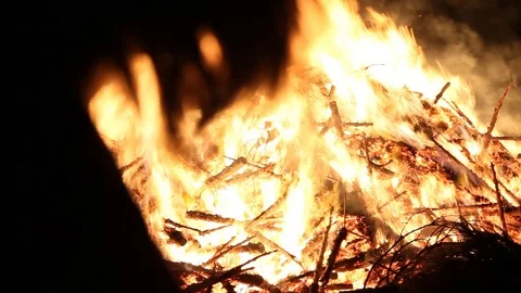 Silhouette in front of fire Stock Footage 122307460