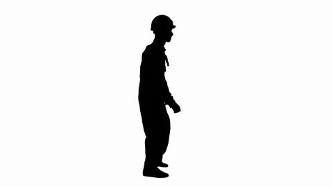 Silhouette Funky dancing by young construction worker in safety hat. Stock Footage 128166507
