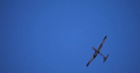 Silhouette of Glider Soaring in Dim Post Sunset Sky. Slow Acrobatic Maneuver Stock Footage 252914188