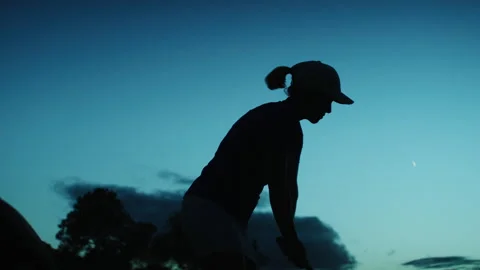 Silhouette of a Golf Player hitting the Golf Ball Stock Footage 264152304