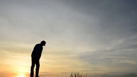 Silhouette of a golfer Stock Footage