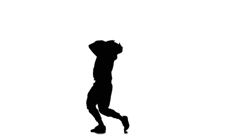 Silhouette of guy dancer dancing hip hop, freestyle, street dance, slow motion Stock Footage 130335045