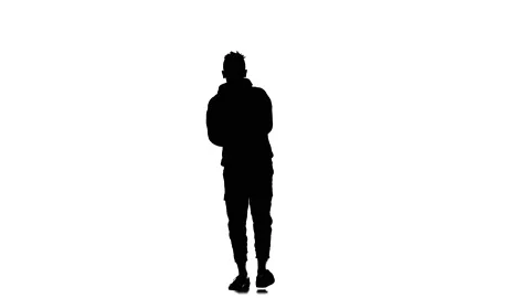 Silhouette of guy dancer dancing hip hop, freestyle, street dance, slow motion Stock Footage 130335259