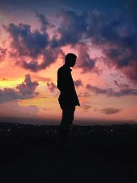Silhouette of A Guy During Magic Hour Stock Photos
