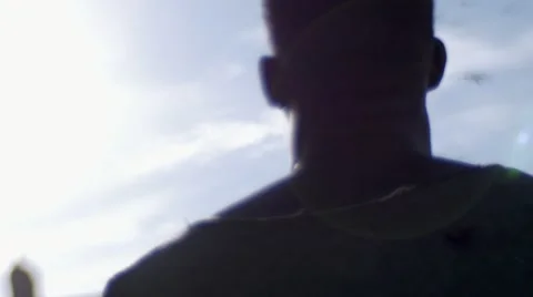 Silhouette guy looking at the birds in the sky 04 Stock Footage 67522730
