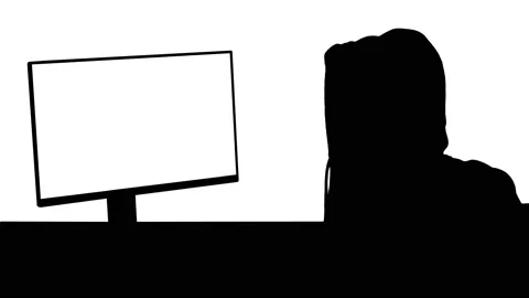 Silhouette Hacker in hood cracking code using pc. Stock Footage 139389453