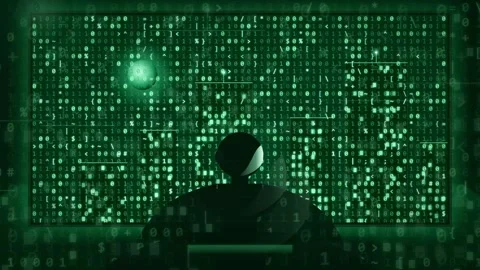 Silhouette of a hacker working with green binary code data on a large digital Stock-Footage 343171057