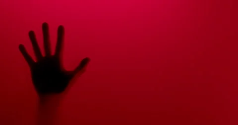 Silhouette hand in red background Stock Footage 133933051