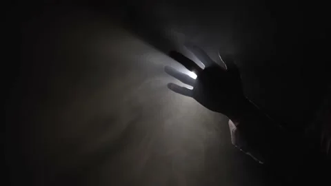 Silhouette of a hand in smoke Stock Footage 155993648