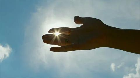 Silhouette of the hands in backlight of sun Stock Footage 52313515