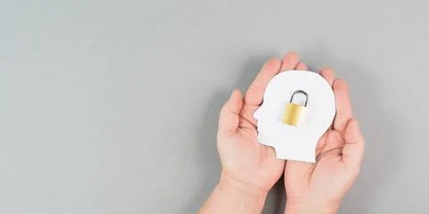 Silhouette of a head with a lock, lockout from computer cloud, safety conc... Stock Photos