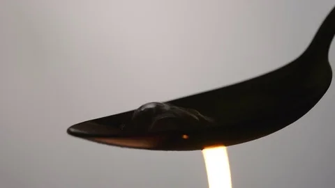 Silhouette of heating a heroin in the spoon Video stock 72643464