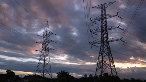 Silhouette of high voltage electrical pole structure Stock Footage 100312221