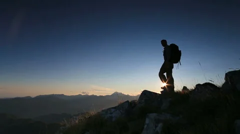 Silhouette of hiker on mountain top Stock Footage 45499448