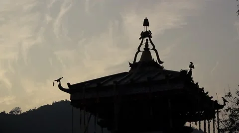 Silhouette of a Hindu temple on a background of clouds Stock Footage 57857211
