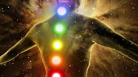 Silhouette of human back with multiple color Chakra dots effect Stock Footage 202151015