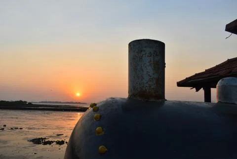 Silhouette image of a train standing behind the sunset Foto stock