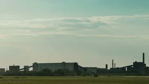 Silhouette of a iron ore processing plant, Opencast mining of iron ore. Stock Footage 94452983